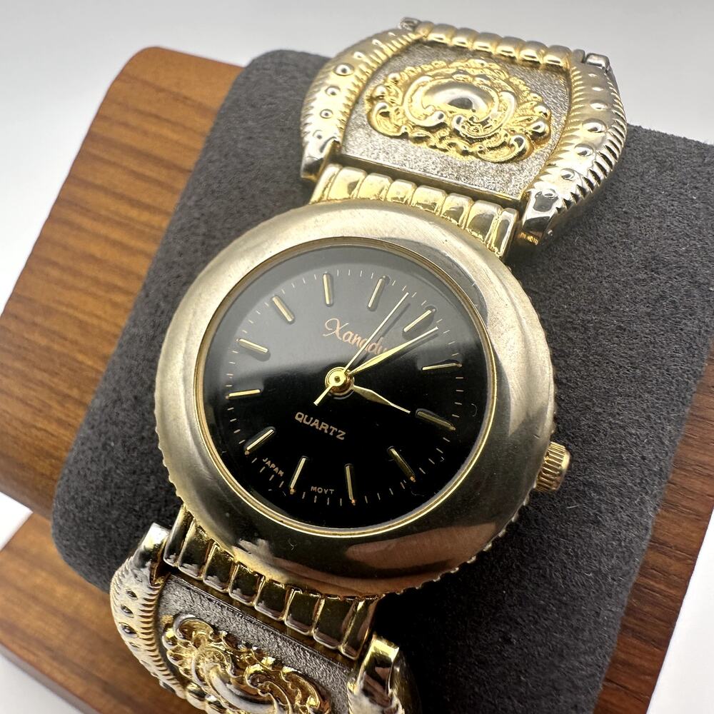 Xanadu Quartz Watch Two Tone Gold Silver Ornate Link Bracelet Black Dial